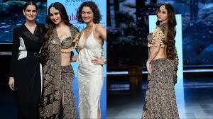 Mouni Roy Exudes Traditional Elegance in a Black and Gold Ajrakh Lehenga Set at Nitya Bajaj’s Fashion Show